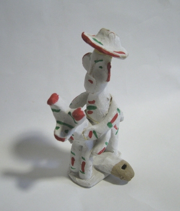 Silbato de cerámica con figura antropomorfa y zoomorfa